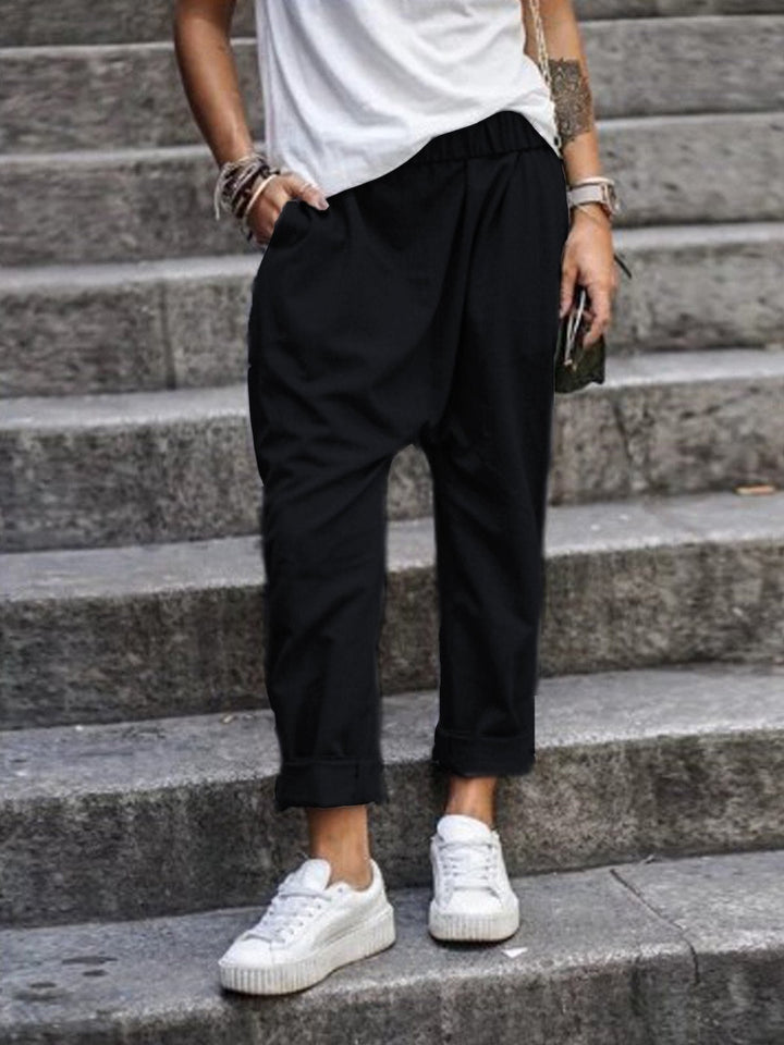 Pantalon femme coupe décontractée avec ceinture élastique – Pantalon streetstyle avec entrejambe bas et revers pour le quotidien et les loisirs